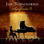 Synfonia II album cover - pianist sitting at piano on stage with orchestra